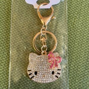 Hello Kitty 2” wide and 4 “ long gold purse accessory